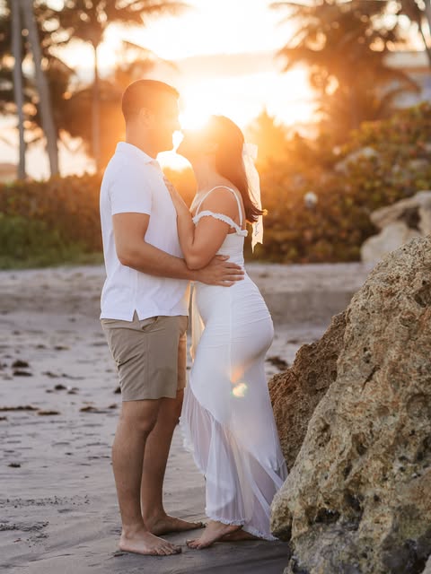 A couple in white in the warm evening light
